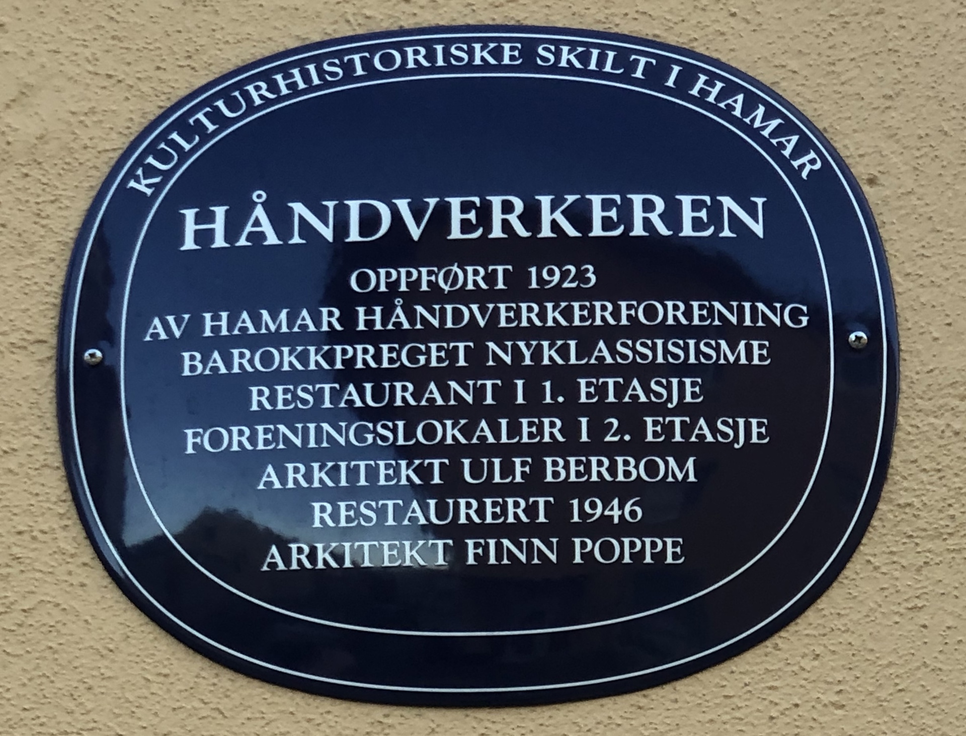 Blått skilt håndverkeren